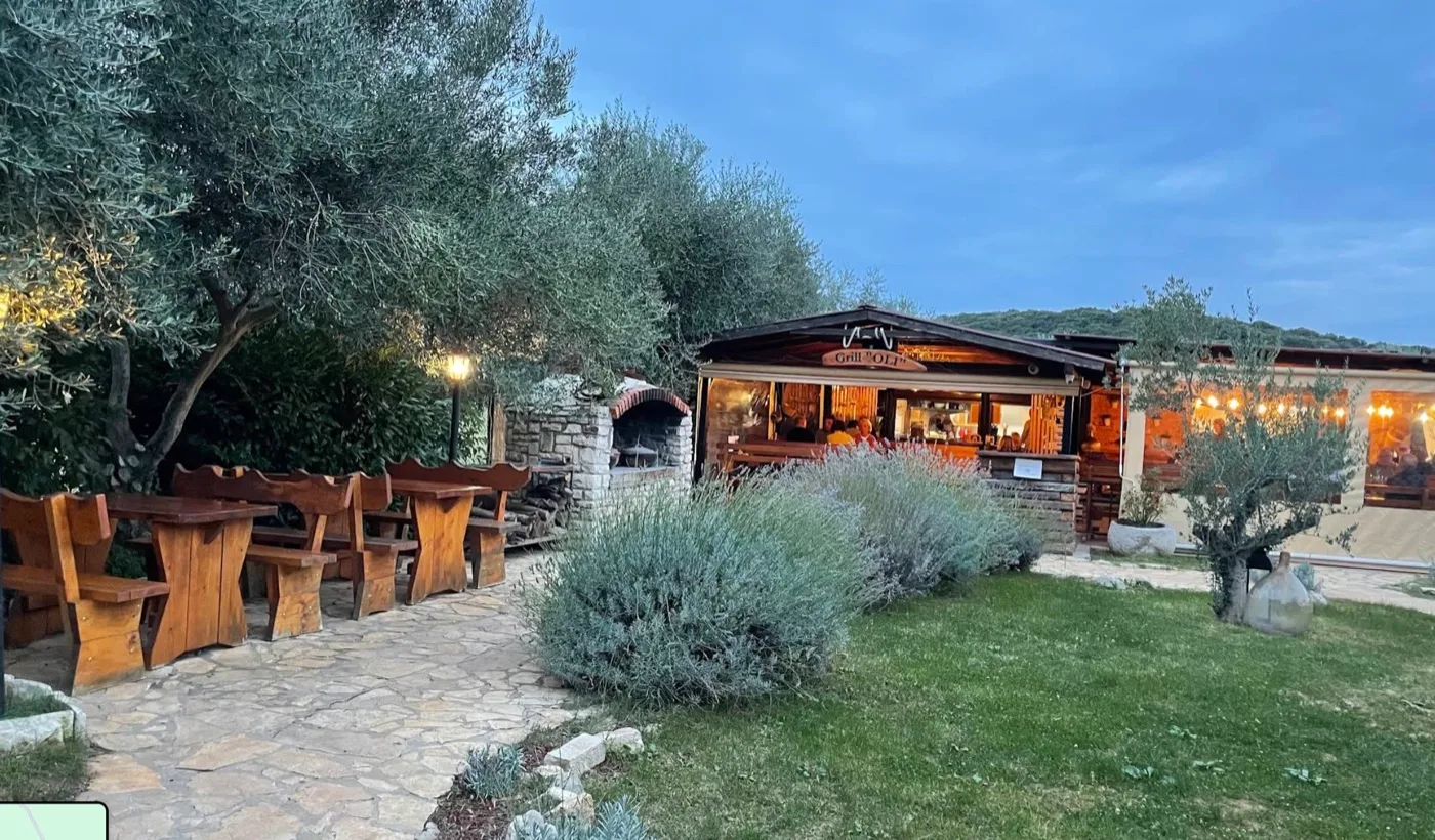 Grill Garden Oli among olive trees at dusk