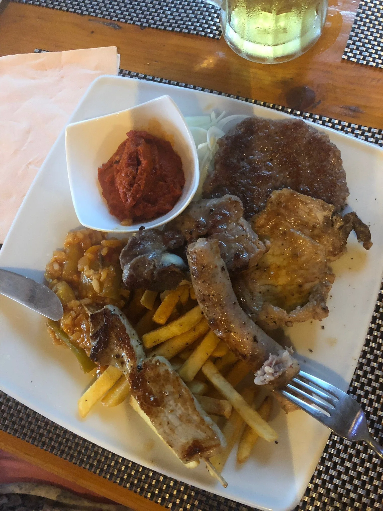 Mixed grilled meats with fries